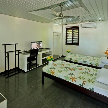 פורטו פרינססה Balay Tuko Garden Inn חדר תמונה
