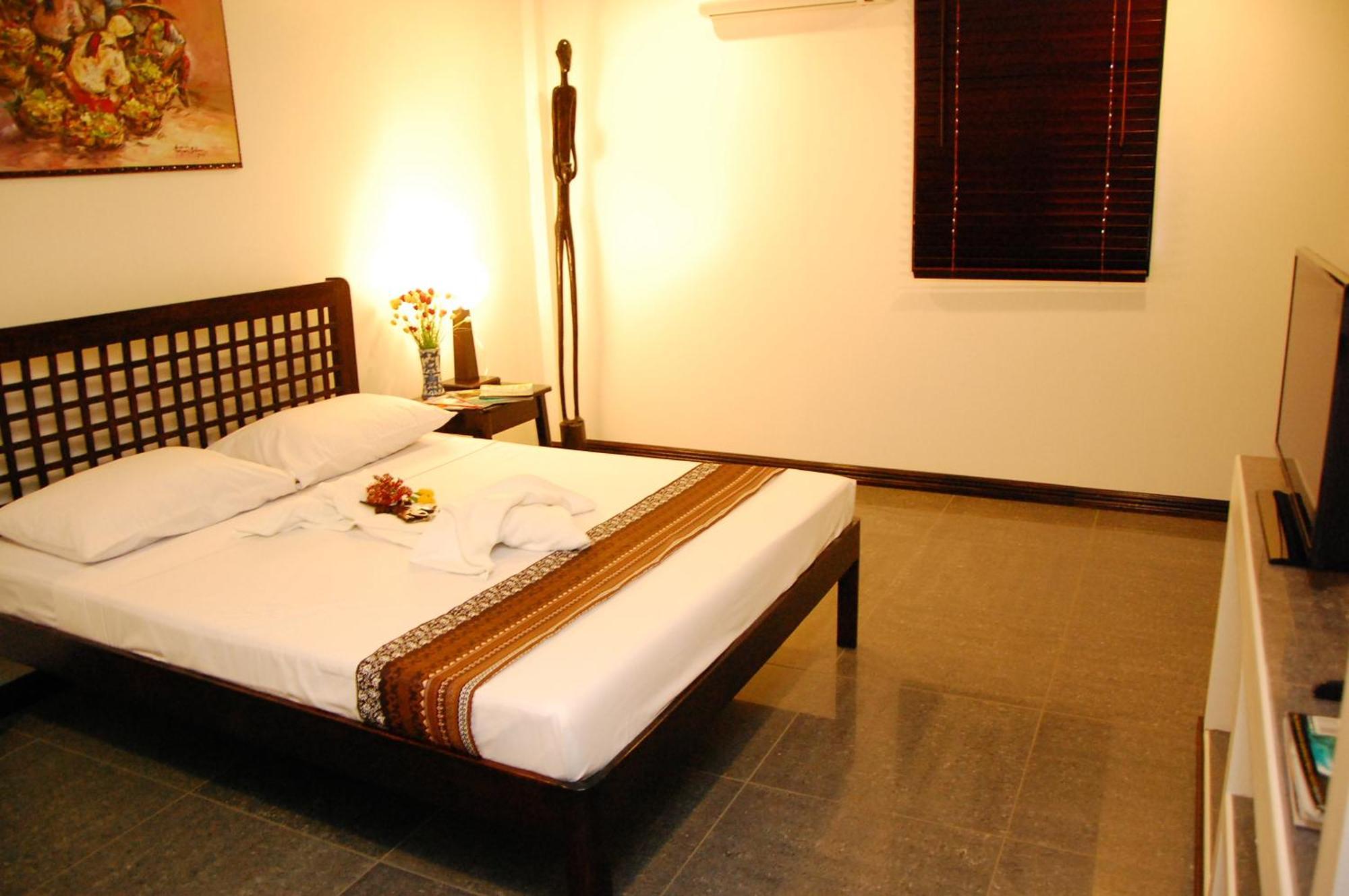 פורטו פרינססה Balay Tuko Garden Inn חדר תמונה